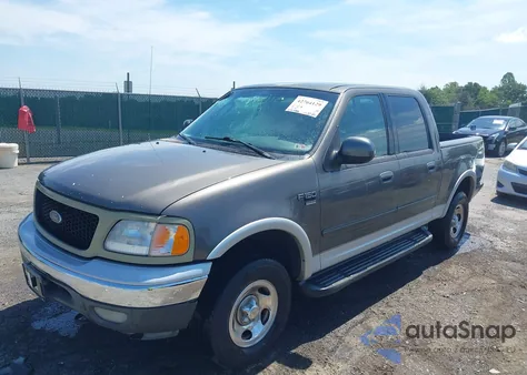 2002 Ford F-150 Lariat/Xlt из США, поврежденный, VIN 1FTRW08L32KE27250